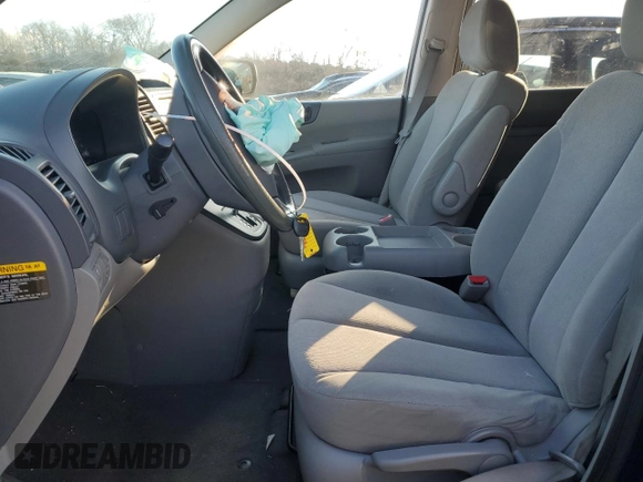 2009 Kia Sedona LX with VIN KNDMB233396298759, listed as a Copart auction lot 42499505 with 141,899 mi miles and Salvage Title. Bid and sale history available at carsss.com. Image 7.