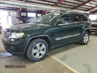2011 Jeep Grand Cherokee Laredo z VIN 1J4RR4GG6BC570331, wystawiony jako Copart lot #59130575 z przebiegiem 145 094 mil mil oraz Tytuł czysty. Historia ofert i sprzedaży dostępna na DreamBid. Obrazek 1.