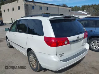 2008 Toyota Sienna XLE with VIN 5TDBK22C28S012097, listed as a IAAI auction lot 41758136 with 203,888 mi miles and . Bid and sale history available at DreamBid. Image 3.