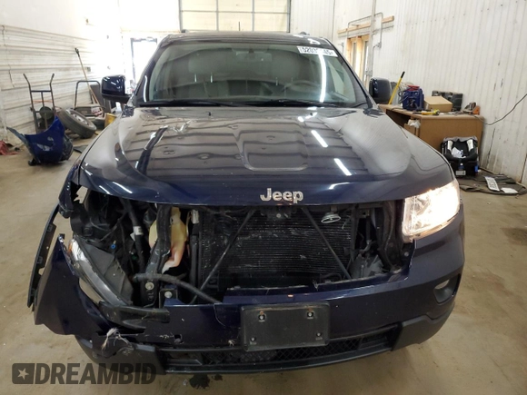 2012 Jeep Grand Cherokee Laredo with VIN 1C4RJFAG9CC221229, listed as a Copart auction lot 52035545 with 70,332 mi miles and Salvage Title. Bid and sale history available at carsss.com. Image 5.