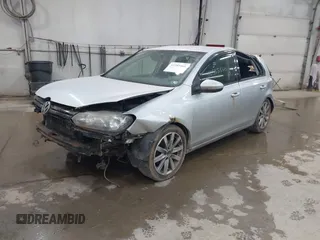 2012 Volkswagen Golf TDI with VIN WVWNM7AJ8CW333137, listed as a IAAI auction lot 42585466 with 213,587 mi miles and . Bid and sale history available at DreamBid. Image 2.