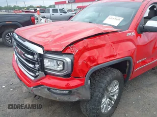 2017 GMC Sierra 1500 SLT z VIN 3GTU2NEC8HG223552, wystawiony jako IAAI lot #42117939 z przebiegiem 103 552 mil mil oraz . Historia ofert i sprzedaży dostępna na DreamBid. Obrazek 6.