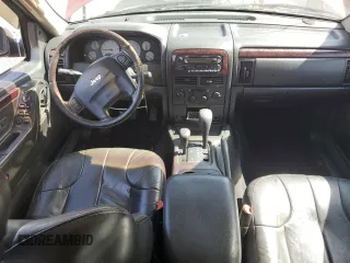 2002 Jeep Grand Cherokee Limited with VIN 1J4GW58N82C182603, listed as a Copart auction lot 57464295 with 240,179 mi miles and Salvage title. Bid and sale history available at DreamBid. Image 8.