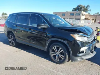 2018 Honda Pilot EX-L with VIN 5FNYF5H58JB013113, listed as a IAAI auction lot 41313206 with 125,825 mi miles. Bid and sale history available at carsss.com. Image 1.