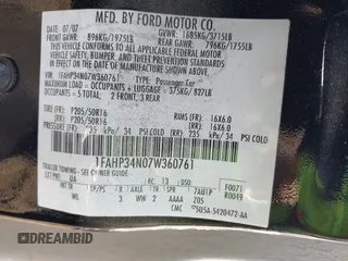 2007 Ford Focus S z VIN 1FAHP34N07W360761, wystawiony jako IAAI lot #40754946 z przebiegiem 121 371 mil mil oraz . Historia ofert i sprzedaży dostępna na DreamBid. Obrazek 9.