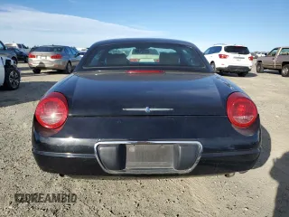 2005 Ford Thunderbird Deluxe with VIN 1FAHP60A35Y105382, listed as a Copart auction lot 88535235 with 104,112 mi miles and Salvage Title. Bid and sale history available at DreamBid. Image 6.