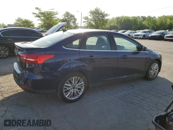 2017 Ford Focus Titanium with VIN 1FADP3J2XHL203959, listed as a Copart auction lot 55498465 with 68,154 mi miles and Salvage title. Bid and sale history available at DreamBid. Image 3.