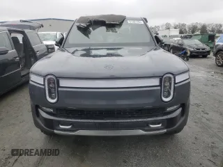 2022 Rivian R1T Adventure z VIN 7FCTGAAA5NN014020, wystawiony jako Copart lot #81367764 z przebiegiem Nie podano mil oraz Szkody całkowita. Historia ofert i sprzedaży dostępna na DreamBid. Obrazek 5.
