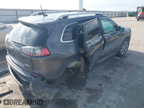 2019 Jeep Cherokee Latitude Plus with VIN 1C4PJMLX8KD418331, listed as a IAAI auction lot 42557107 with 108,096 mi miles and . Bid and sale history available at DreamBid. Image 4.