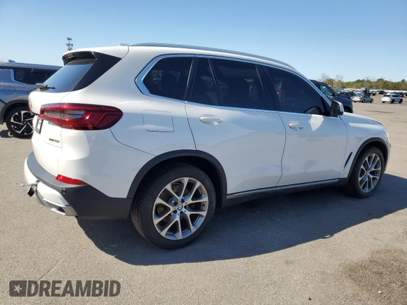 2020 BMW X5 xDrive40i with VIN 5UXCR6C09L9C13127, listed as a Copart auction lot 53941035 with 76,685 mi miles and Salvage title. Bid and sale history available at DreamBid. Image 3.