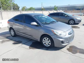2013 Hyundai Accent GLS with VIN KMHCT4AE4DU581616, listed as a IAAI auction lot 42024701 with 141,240 mi miles. Bid and sale history available at carsss.com. Image 1.