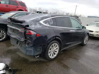 2018 Tesla Model X 75D with VIN 5YJXCBE20JF119875, listed as a Copart auction lot 50772175 with 48,805 mi miles and Salvage Title. Bid and sale history available at carsss.com. Image 3.