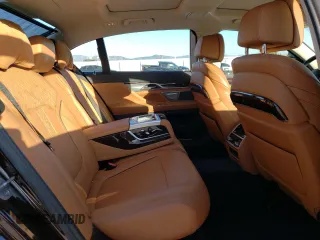 2020 BMW 7 Series with VIN WBA7W4C06LBM70555, listed as a Copart auction lot 52126455 with 37,375 mi miles and Salvage title. Bid and sale history available at DreamBid. Image 10.