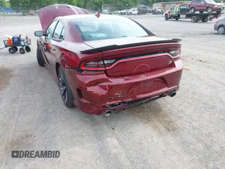 2020 Dodge Charger Scat Pack z VIN 2C3CDXGJ9LH112566, wystawiony jako IAAI lot #42330916 z przebiegiem 143 710 mil mil oraz . Historia ofert i sprzedaży dostępna na DreamBid. Obrazek 6.