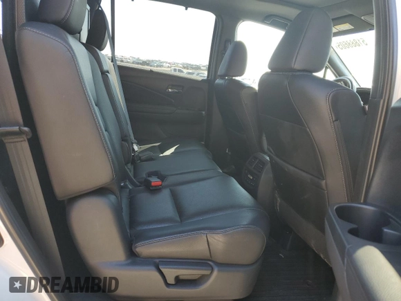 2019 Honda Passport Touring z VIN 5FNYF8H95KB023801, wystawiony jako Copart lot #51888605 z przebiegiem 77 060 mil mil oraz Szkoda całkowita • Salvage title. Historia ofert i sprzedaży dostępna na DreamBid. Obrazek 11.