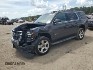 2015 Chevrolet Tahoe LT with VIN 1GNSCBKC1FR240186, listed as a Copart auction lot 64741425 with 110,357 mi miles and Salvage title. Bid and sale history available at DreamBid. Image 1.