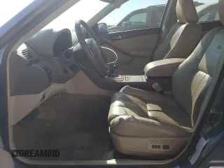 2006 Infiniti G35 with VIN JNKCV51F06M603920, listed as a Copart auction lot 74150574 with 210,890 mi miles and Salvage Title. Bid and sale history available at DreamBid. Image 7.