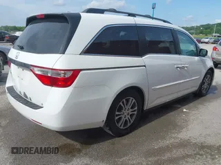 2011 Honda Odyssey EX-L with VIN 5FNRL5H60BB026171, listed as a IAAI auction lot 42511296 with 288,827 mi miles and . Bid and sale history available at DreamBid. Image 4.