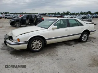 1997 Cadillac Seville Luxury SLS z VIN 1G6KS52Y0VU819998, wystawiony jako Copart lot #55979335 z przebiegiem 87 054 mil mil oraz Szkoda całkowita • Salvage title. Historia ofert i sprzedaży dostępna na DreamBid. Obrazek 1.