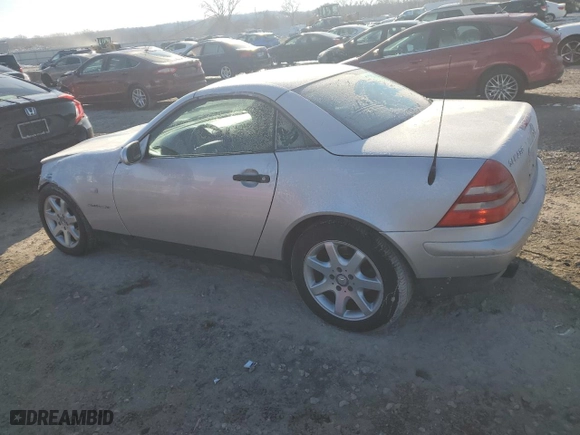 1998 Mercedes-Benz SLK-Class with VIN WDBKK47F2WF075050, listed as a Copart auction lot 83265144 with 116,078 mi miles and Salvage Title. Bid and sale history available at carsss.com. Image 2.