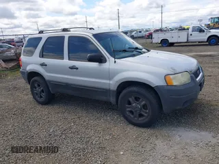 2003 Ford Escape XLT Popular with VIN 1FMYU03143KC35971, listed as a IAAI auction lot 42142582 with 197,671 mi miles and . Bid and sale history available at DreamBid. Image 1.
