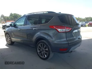 2014 Ford Escape SE z VIN 1FMCU0G97EUE34174, wystawiony jako IAAI lot #42274846 z przebiegiem 121 801 mil mil oraz . Historia ofert i sprzedaży dostępna na DreamBid. Obrazek 3.