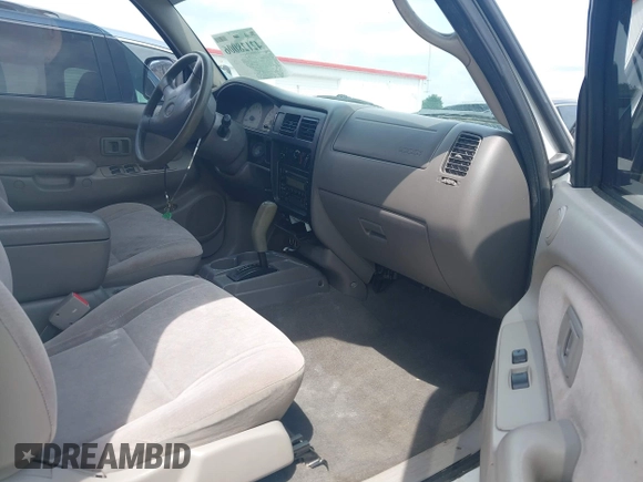 2001 Toyota Tacoma PreRunner z VIN 5TEGN92N11Z805360, wystawiony jako IAAI lot #42128006 z przebiegiem 295 381 mil mil oraz . Historia ofert i sprzedaży dostępna na DreamBid. Obrazek 5.