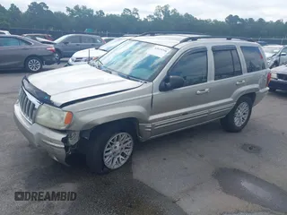 2004 Jeep Grand Cherokee Limited with VIN 1J4GX58SX4C255363, listed as a IAAI auction lot 42619798 with 239,475 mi miles and . Bid and sale history available at DreamBid. Image 2.