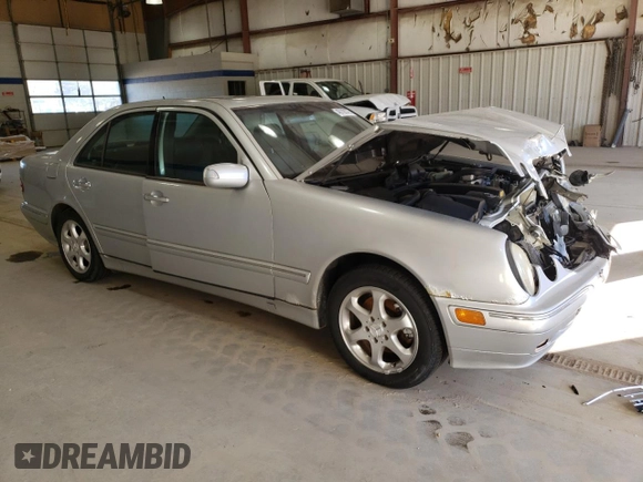 2002 Mercedes-Benz E-Class with VIN WDBJF65J12B499887, listed as a Copart auction lot 48708375 with 194,556 mi miles and Salvage Title. Bid and sale history available at carsss.com. Image 4.