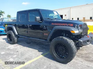 2021 Jeep Gladiator Mojave z VIN 1C6JJTEG3ML554606, wystawiony jako IAAI lot #42392053 z przebiegiem 58 297 mil mil oraz . Historia ofert i sprzedaży dostępna na DreamBid. Obrazek 1.