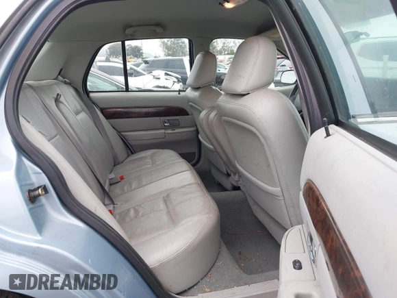 2005 Mercury Grand Marquis GS z VIN 2MEFM74W45X629662, wystawiony jako IAAI lot #42075152 z przebiegiem 65 941 mil mil oraz . Historia ofert i sprzedaży dostępna na DreamBid. Obrazek 8.