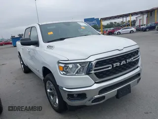 2022 Ram 1500 Big Horn with VIN 1C6SRFFT3NN456823, listed as a IAAI auction lot 42417659 with 5,313 mi miles and . Bid and sale history available at DreamBid. Image 1.