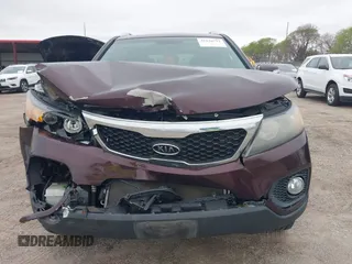 2011 Kia Sorento LX with VIN 5XYKTCA11BG070046, listed as a IAAI auction lot 42136751 with 112,661 mi miles and . Bid and sale history available at DreamBid. Image 6.