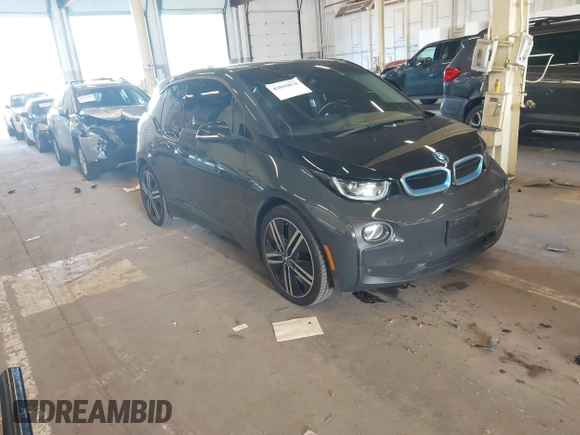 2015 BMW i3 z VIN WBY1Z2C5XFV556131, wystawiony jako IAAI lot #42050070 z przebiegiem 60 889 mil mil oraz . Historia ofert i sprzedaży dostępna na DreamBid. Obrazek 1.