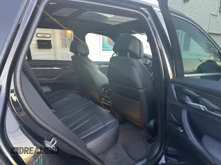 2018 BMW X5 xDrive35i with VIN 5UXKR0C57J0X83615, listed as a Copart auction lot 83307484 with 174,911 mi miles and Clean Title. Bid and sale history available at carsss.com. Image 7.