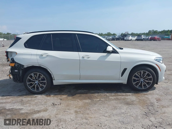 2021 BMW X5 xDrive45e with VIN 5UXTA6C08M9F38909, listed as a IAAI auction lot 42172536 with 71,741 mi miles and . Bid and sale history available at DreamBid. Image 14.