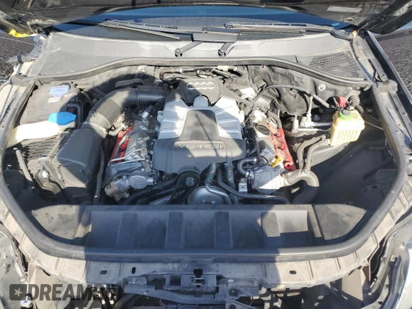 2015 Audi Q7 Premium Plus z VIN WA1LGAFE6FD023540, wystawiony jako Copart lot #57227145 z przebiegiem 124 203 mil mil oraz Szkoda całkowita • Salvage title. Historia ofert i sprzedaży dostępna na DreamBid. Obrazek 12.