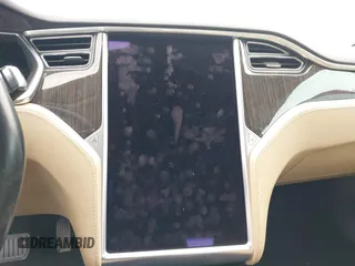 2013 Tesla Model S with VIN 5YJSA1CG0DFP14545, listed as a IAAI auction lot 41806844 with Not Provided miles. Bid and sale history available at carsss.com. Image 17.