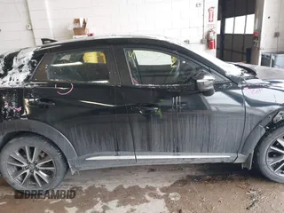 2016 Mazda CX-3 Grand Touring with VIN JM1DKFD71G0132801, listed as a IAAI auction lot 41573276 with 90,000 mi miles. Bid and sale history available at carsss.com. Image 13.
