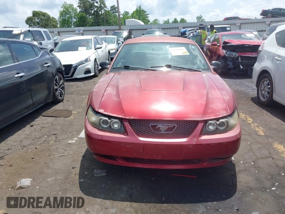 2003 Ford Mustang Standard z VIN 1FAFP40473F441647, wystawiony jako IAAI lot #42179189 z przebiegiem 138 460 mil mil oraz . Historia ofert i sprzedaży dostępna na DreamBid. Obrazek 12.