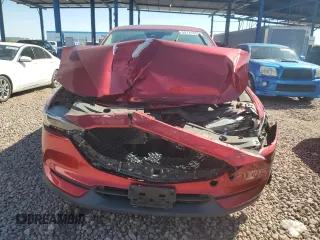 2017 Mazda CX-5 Grand Touring with VIN JM3KFBDL0H0118057, listed as a Copart auction lot 50121335 with 148,275 mi miles and Salvage Title. Bid and sale history available at carsss.com. Image 5.