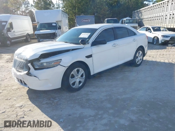 2014 Ford Police Interceptor z VIN 1FAHP2MK2EG125804, wystawiony jako IAAI lot #41297103 z przebiegiem 99 340 mil mil oraz . Historia ofert i sprzedaży dostępna na DreamBid. Obrazek 2.