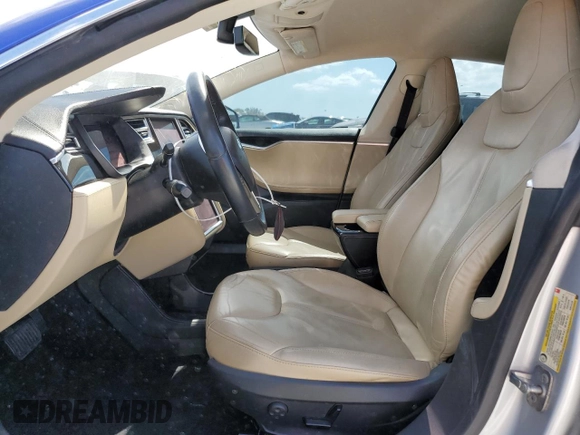 2014 Tesla Model S 60 with VIN 5YJSA1S14EFP44162, listed as a Copart auction lot 52943025 with Not Provided miles and Salvage Title. Bid and sale history available at DreamBid. Image 7.