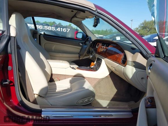 1997 Jaguar XK with VIN SAJGX2748VC011754, listed as a IAAI auction lot 41979459 with 34,601 mi miles and . Bid and sale history available at DreamBid. Image 5.