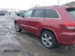 2014 Jeep Grand Cherokee Overland with VIN 1C4RJFCG9EC299235, listed as a IAAI auction lot 41670065 with 108,589 mi miles and . Bid and sale history available at DreamBid. Image 17.