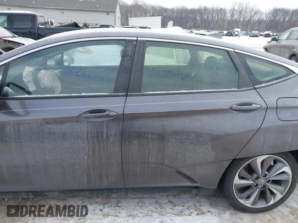 2018 Honda Clarity z VIN JHMZC5F13JC006627, wystawiony jako IAAI lot #41335364 z przebiegiem 58 662 mil mil oraz . Historia ofert i sprzedaży dostępna na DreamBid. Obrazek 14.