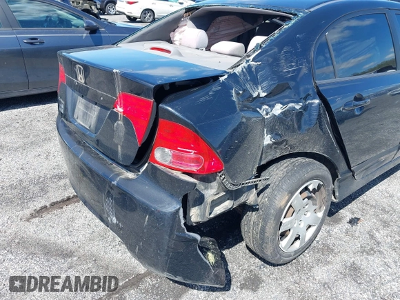 2007 Honda Civic Sdn LX with VIN 1HGFA16577L134935, listed as a IAAI auction lot 41975087 with 255,338 mi miles. Bid and sale history available at carsss.com. Image 6.