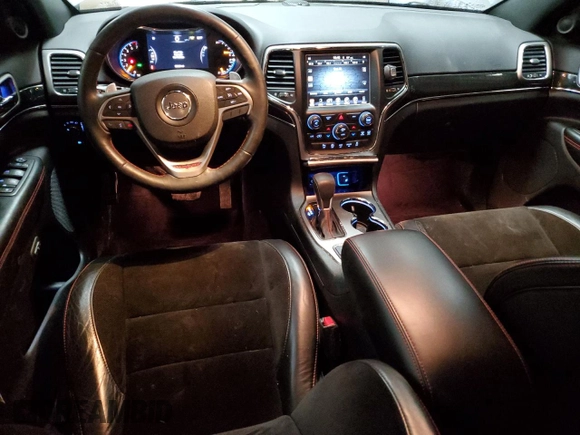 2017 Jeep Grand Cherokee Trailhawk with VIN 1C4RJFLG8HC618709, listed as a Copart auction lot 52899194 with 69,000 mi miles and Salvage title. Bid and sale history available at DreamBid. Image 8.