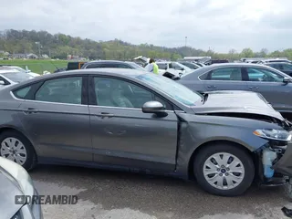2014 Ford Fusion S with VIN 3FA6P0G70ER377725, listed as a IAAI auction lot 42007410 with 56,552 mi miles and . Bid and sale history available at carsss.com. Image 14.