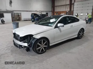 2015 Mercedes-Benz C 250 with VIN WDDGJ4HB5FG375879, listed as a IAAI auction lot 42454524 with 50,588 mi miles and . Bid and sale history available at DreamBid. Image 2.